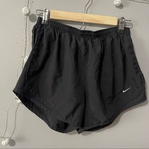 Black Nike running shorts